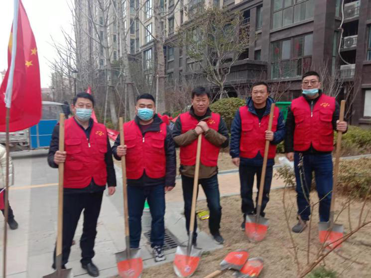 三月春风扑面来 物业服务暖心怀